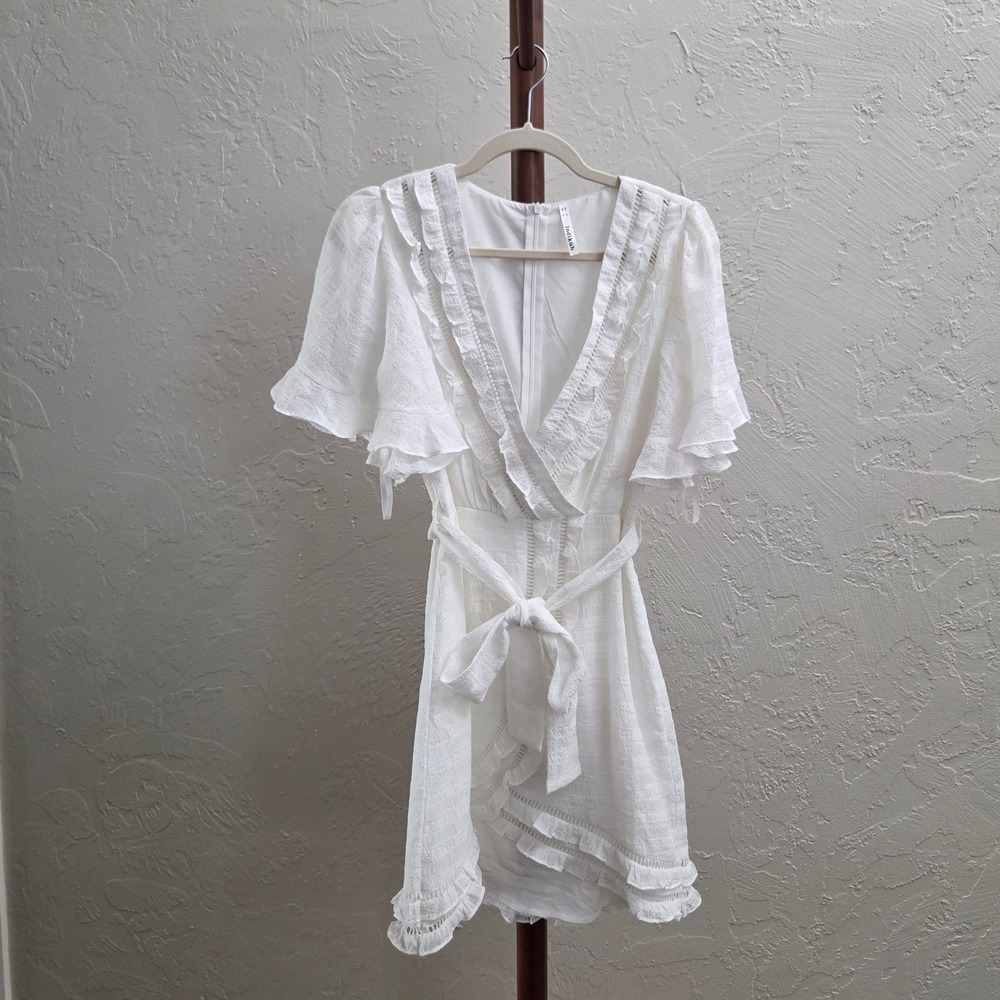 D277. White Textured Ruffle V-Neck Mini Dress